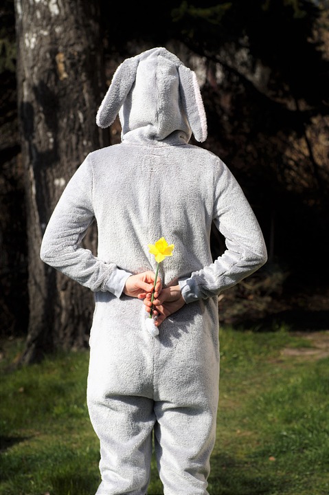 Singing Telegram Ideas. Singing Telegram in bunny costume with flowers.